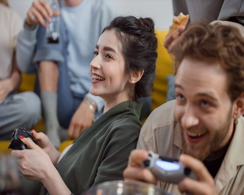 Friends enjoying a gaming exhibition weekend